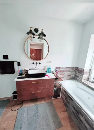 a living room with a couch and a flat screen tv