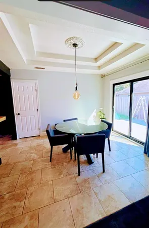 a living room with a couch and a table