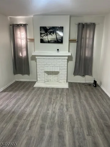 wooden floor in a hall with an entryway
