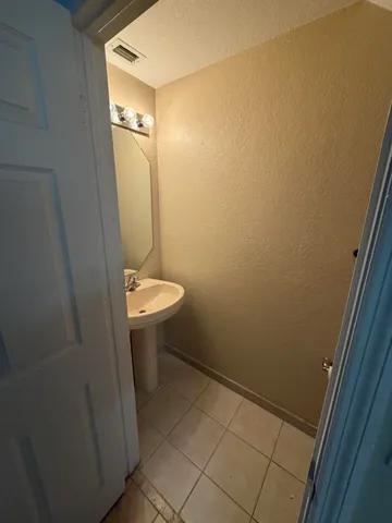 a bathroom with a sink and toilet