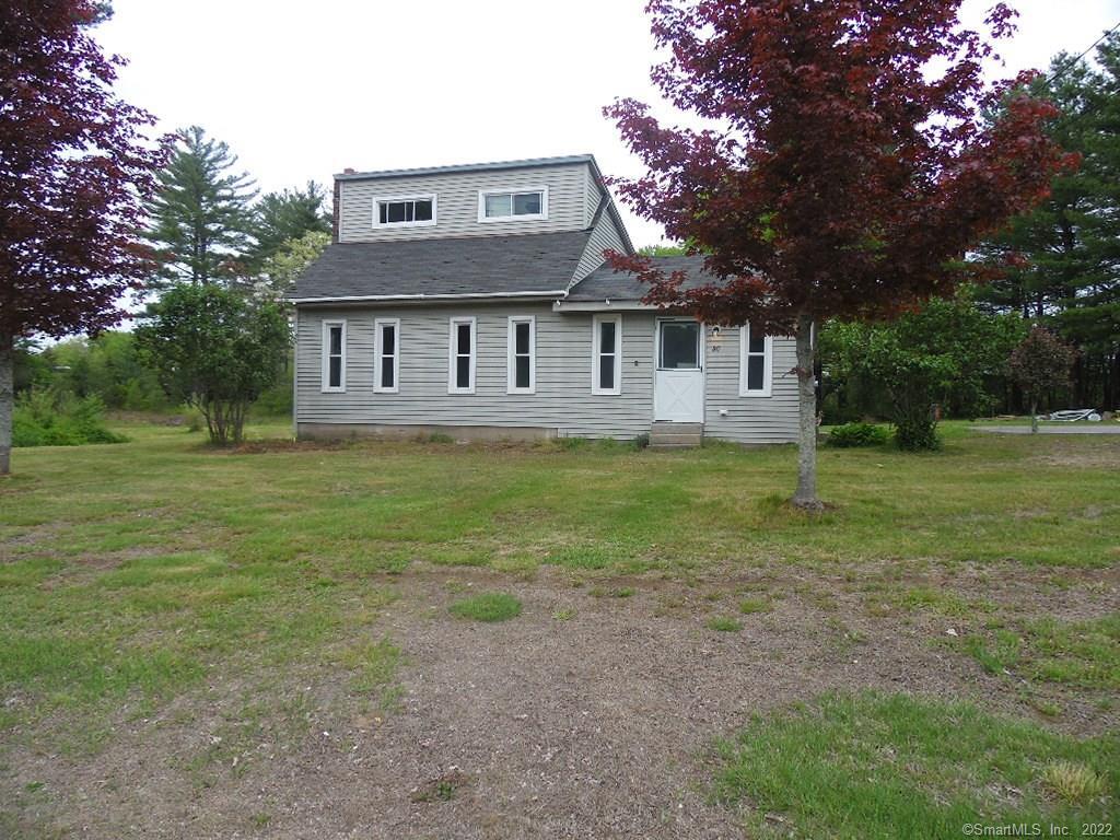 86 Tarbox Road Plainfield, CT 06374 - Photo 1 of 1 a front view of house with yard and trees