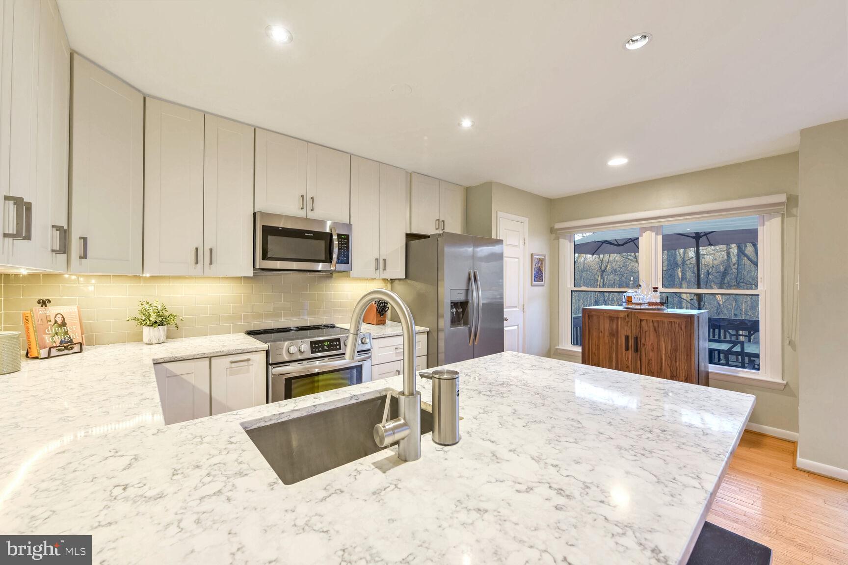1642 Oak Spring Way Reston, VA 20190 - Photo 13 of 30 Gorgeous Quartz Countertops