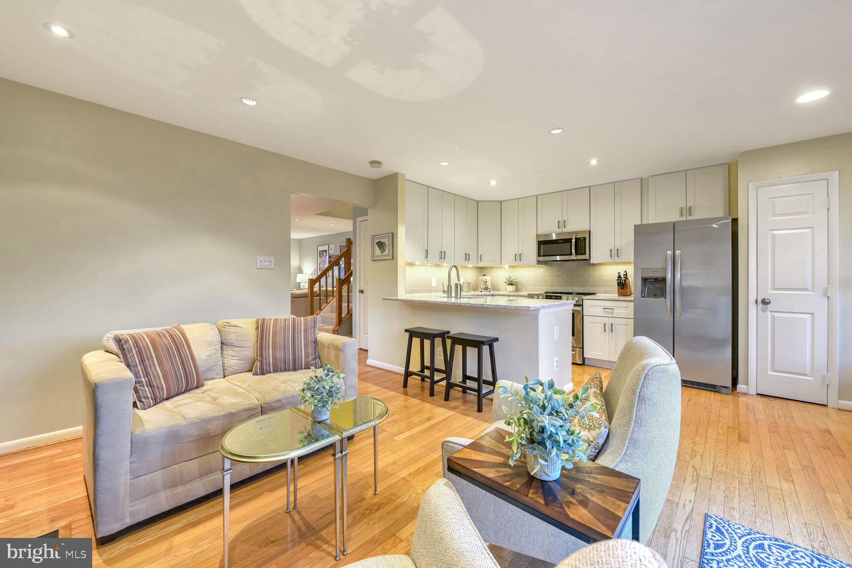 1642 Oak Spring Way Reston, VA 20190 - Photo 7 of 30 Open Living Area and Remodeled Kitchen