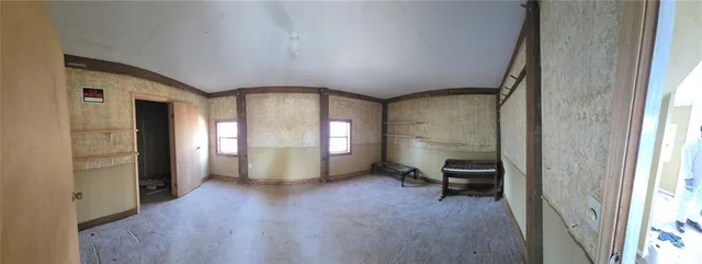 a bathroom with a sink vanity granite and a mirror