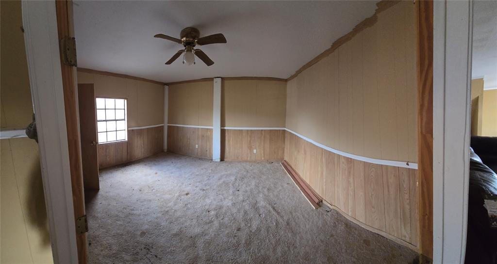2240 County Road 2162 Barry, TX 75102 - Photo 15 of 33 a view of empty room with a ceiling fan and window