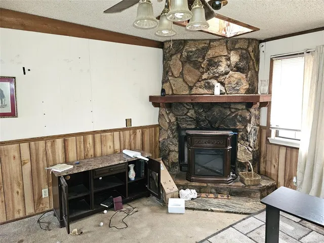 a view of a livingroom with furniture and door