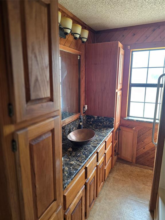 2240 County Road 2162 Barry, TX 75102 - Photo 22 of 33 a bathroom with a sink and a mirror