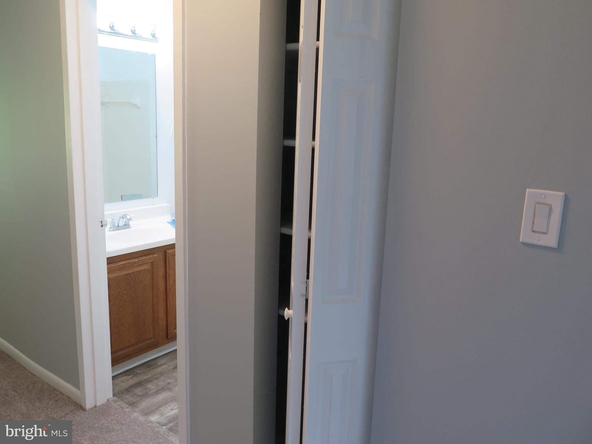 1424 Northgate Square, Unit 21B Reston, VA 20190 - Photo 18 of 28 Linen closet next to Hall Bathroom