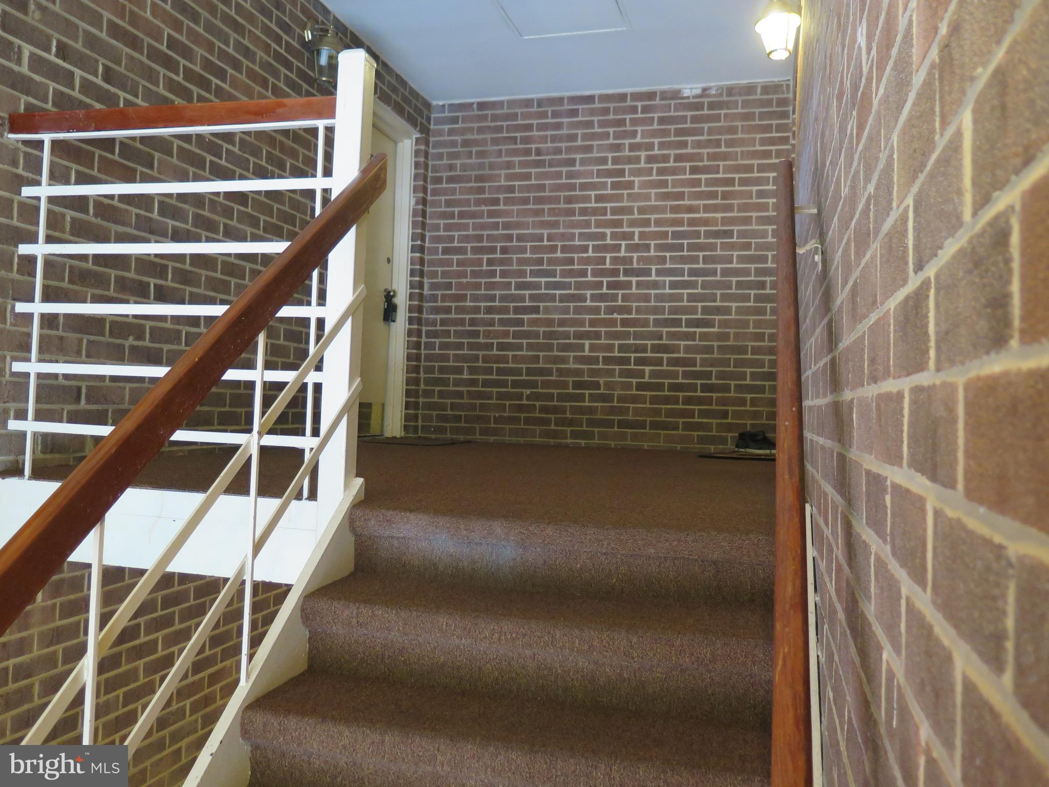 1424 Northgate Square, Unit 21B Reston, VA 20190 - Photo 23 of 28 Stairs to condo door- 2 flights from exterior door