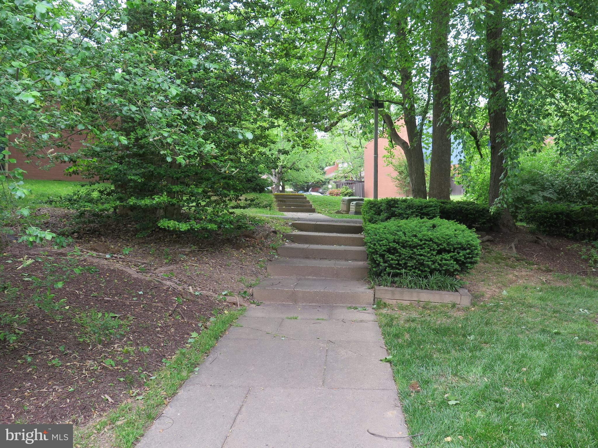 1424 Northgate Square, Unit 21B Reston, VA 20190 - Photo 26 of 28 Walkway from building to Reston walk/bike path