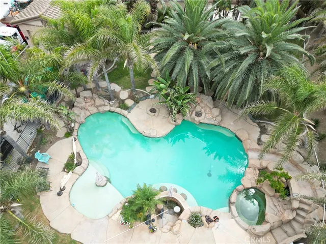 an aerial view of a swimming pool
