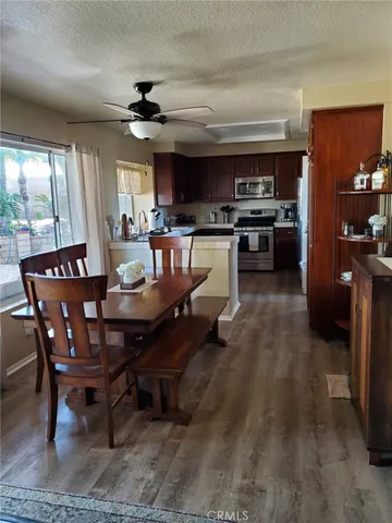 a view of a dining room kitchen and furniture