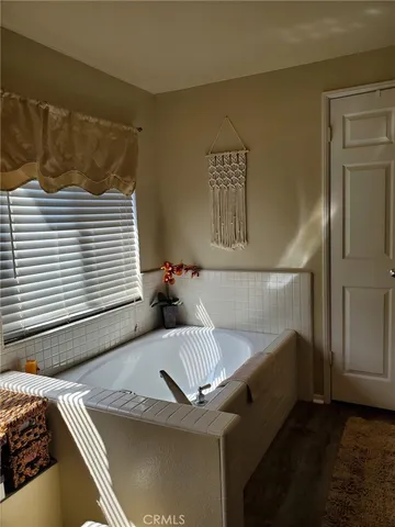 a view of a bedroom with a couch