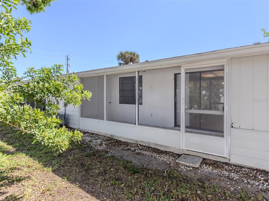 662 Substation Road Venice, FL 34285 - Photo 24 of 26 a view of a house with a yard