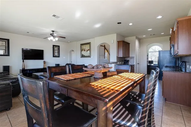 a view of a a dining room with furniture
