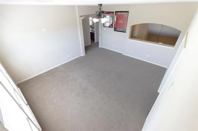 a view of a kitchen cabinets and a stove