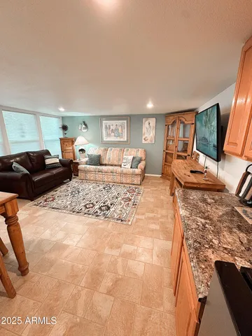 a bed room with a bed and a table