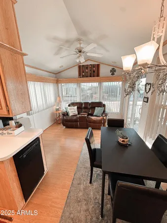 a kitchen with a stove a sink and a microwave