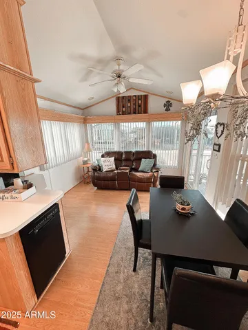 a kitchen with a stove a sink and a microwave