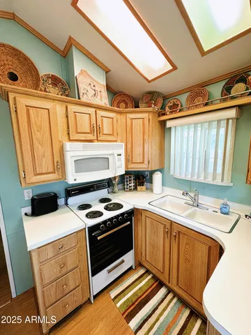 a bathroom with a sink a toilet and a vanity