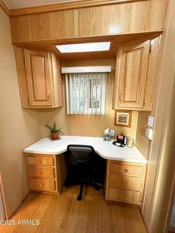 a bedroom with two beds and a couch