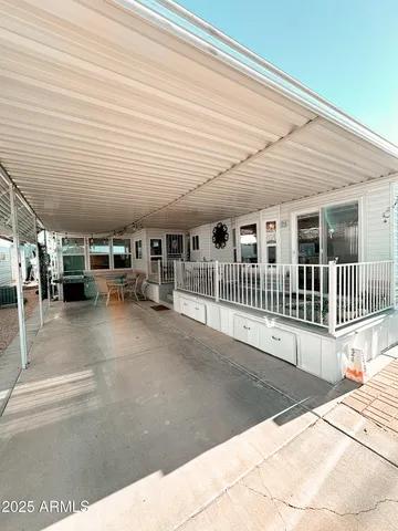 a view of a porch with seating space