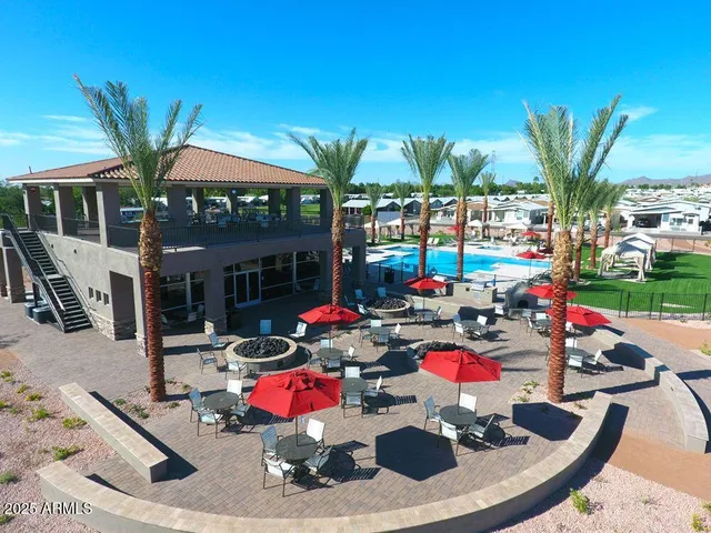 a view of a chairs and table in a patio