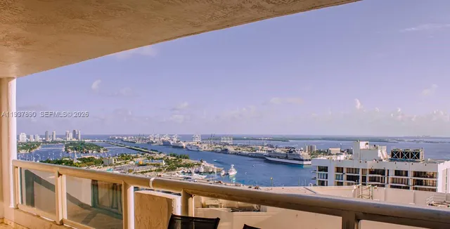 a view of a balcony with city