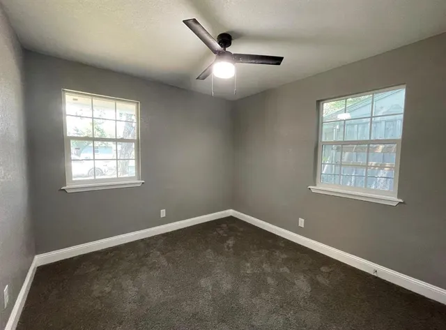 a view of backyard with green space