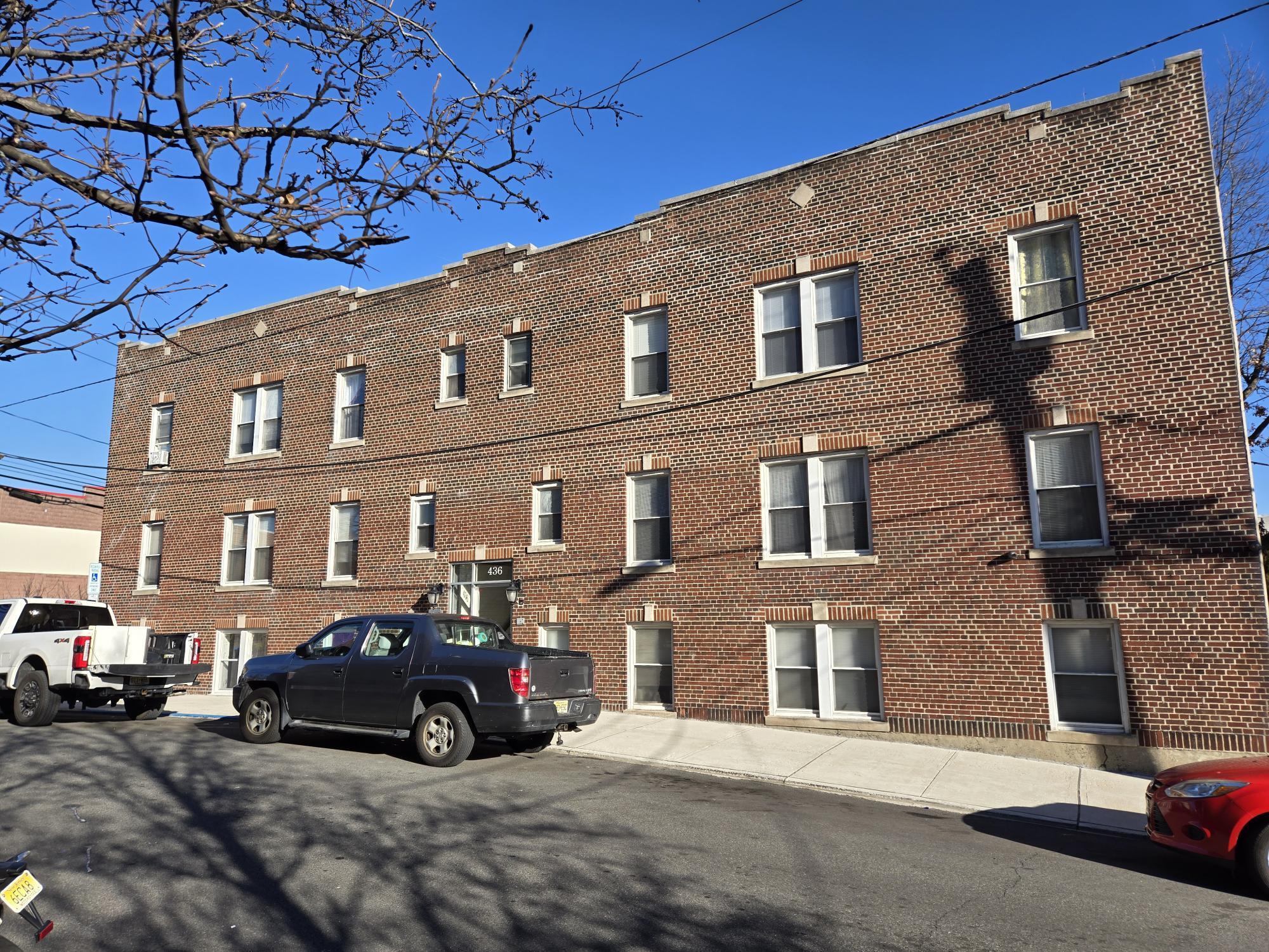 436 Anderson Avenue, Unit 4 Cliffside Park, NJ 07010 - Photo 5 of 7 a car parked in front of a building