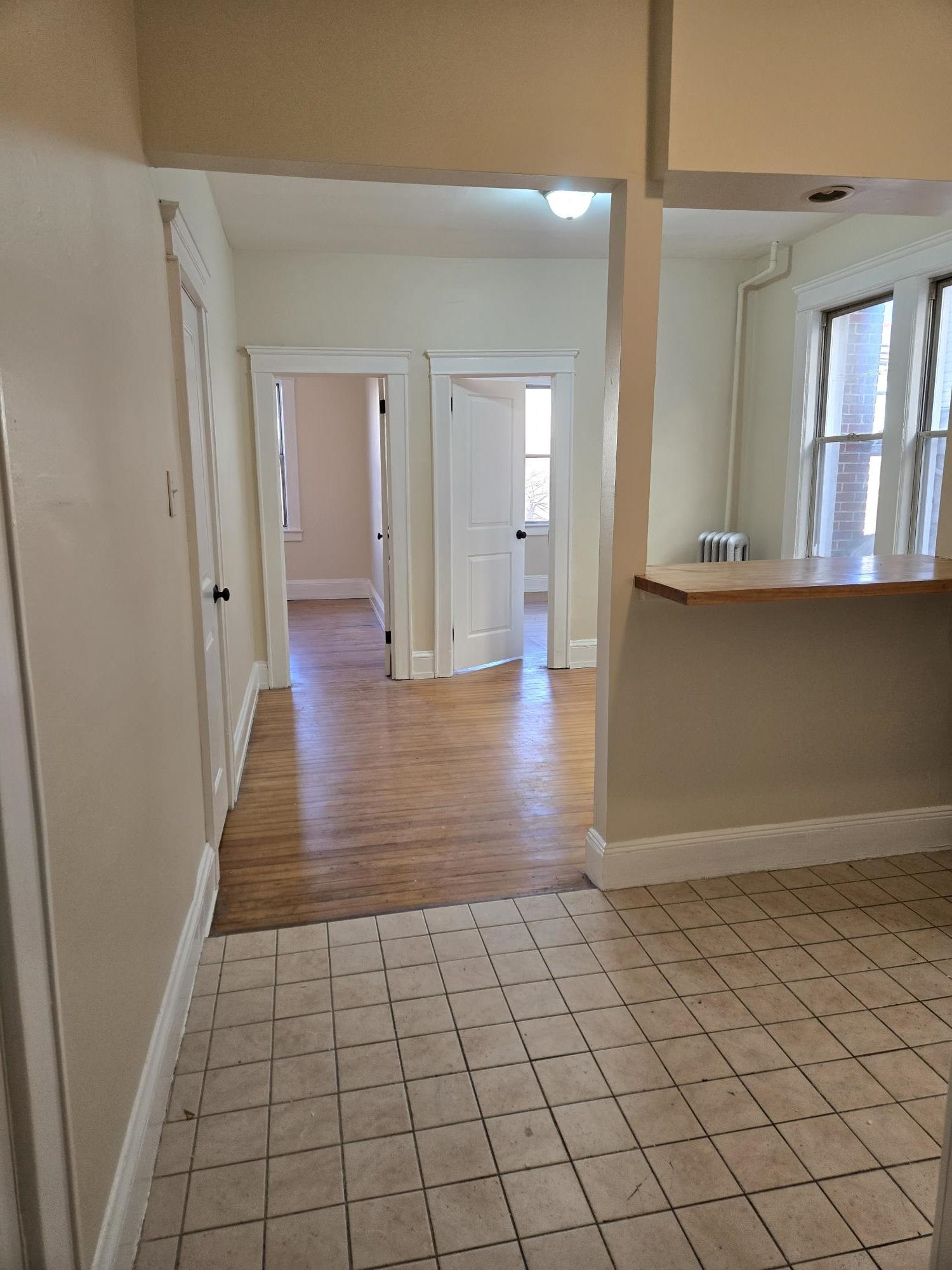 436 Anderson Avenue, Unit 4 Cliffside Park, NJ 07010 - Photo 7 of 7 a view of an empty room and wooden floor