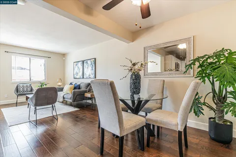 a view of a livingroom with furniture and a window