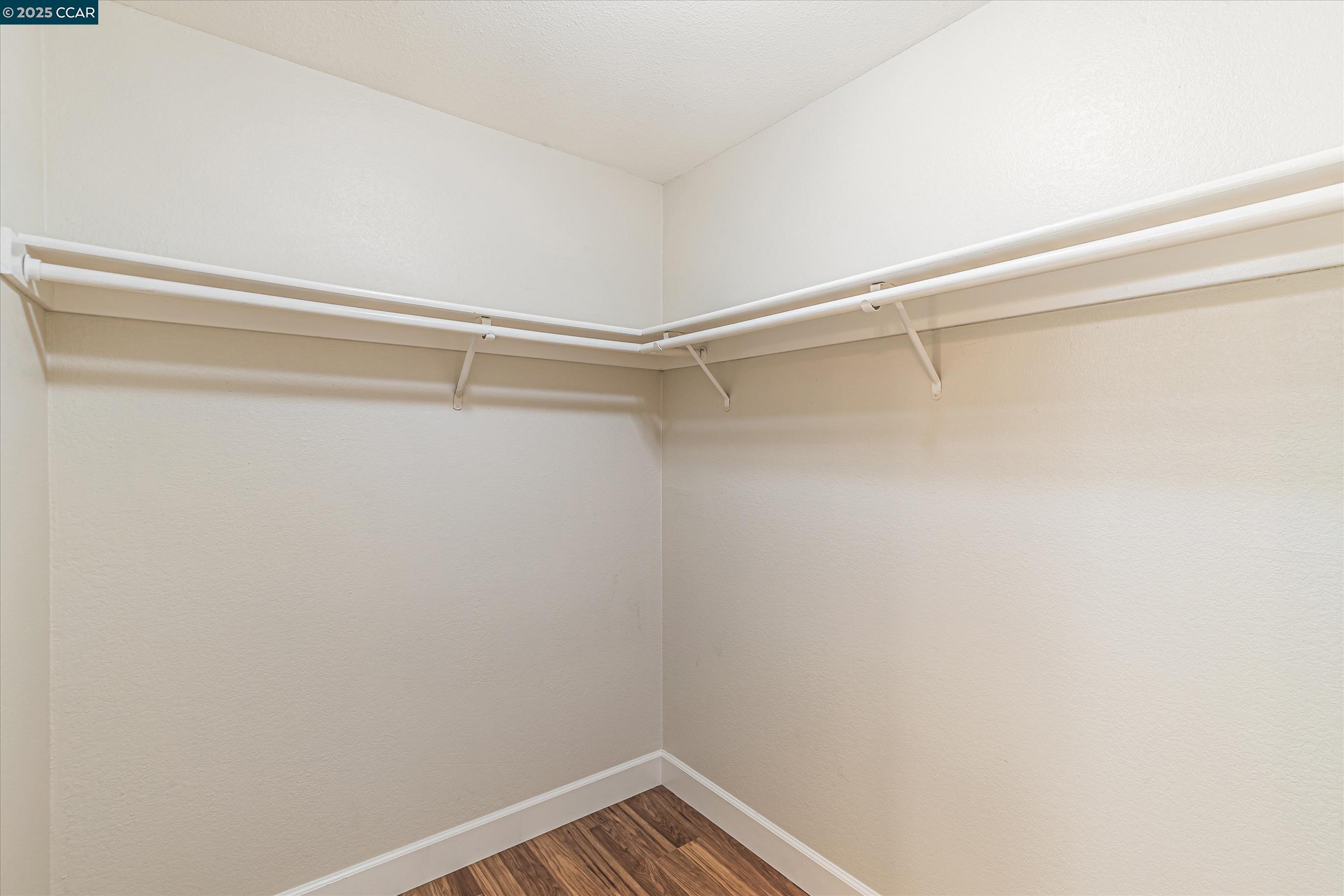 5055 Valley Crest Drive, Unit 196 Concord, CA 94521 - Photo 19 of 36 a view of a room with racks on the wall