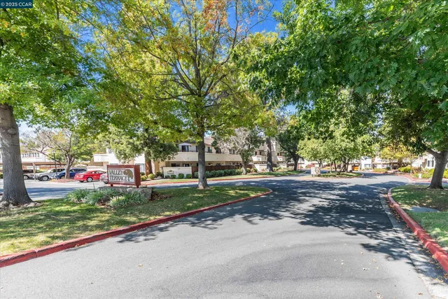 a view of street with sign board