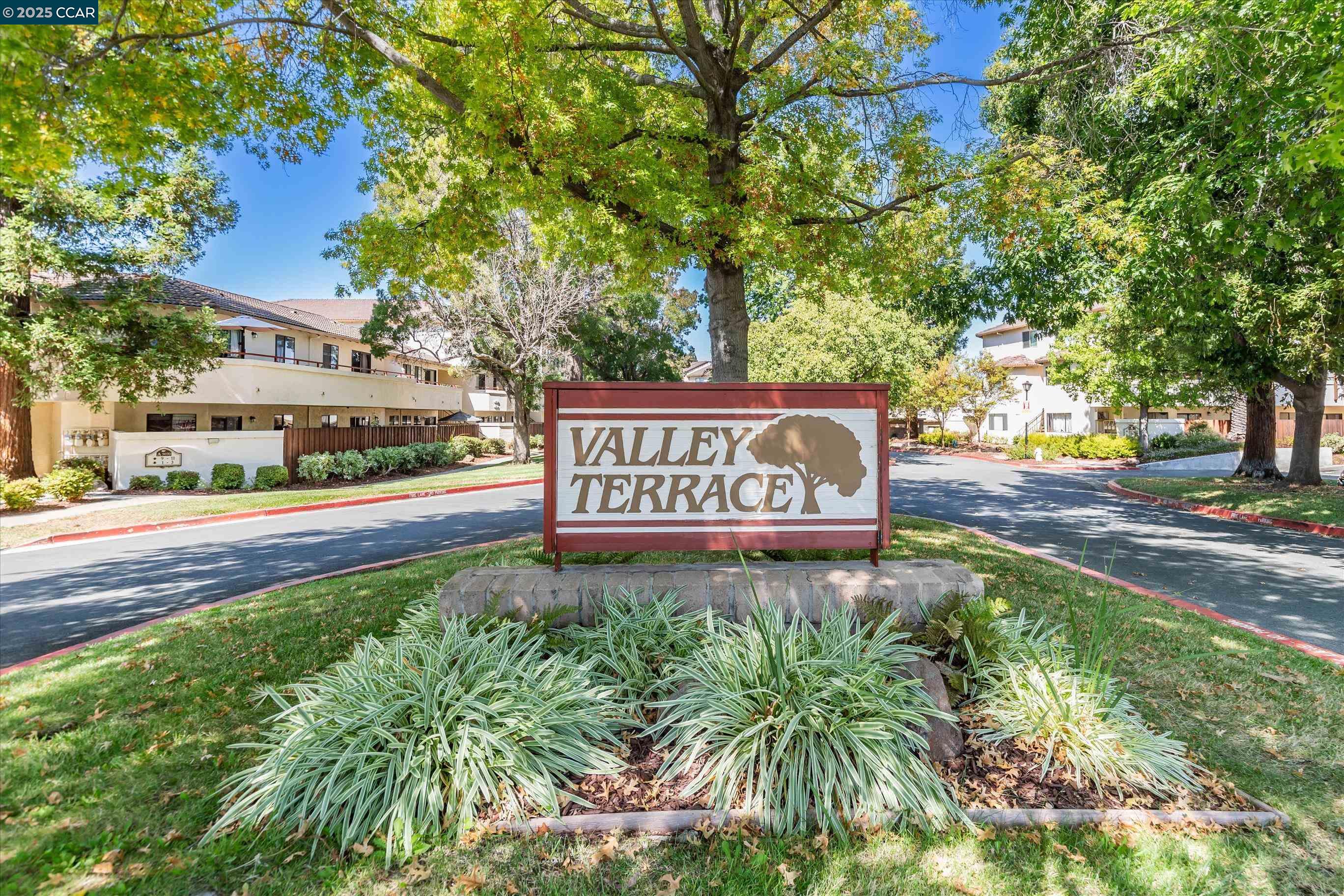 5055 Valley Crest Drive, Unit 196 Concord, CA 94521 - Photo 35 of 36 a view of street with sign board