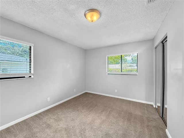 a view of a room with a window