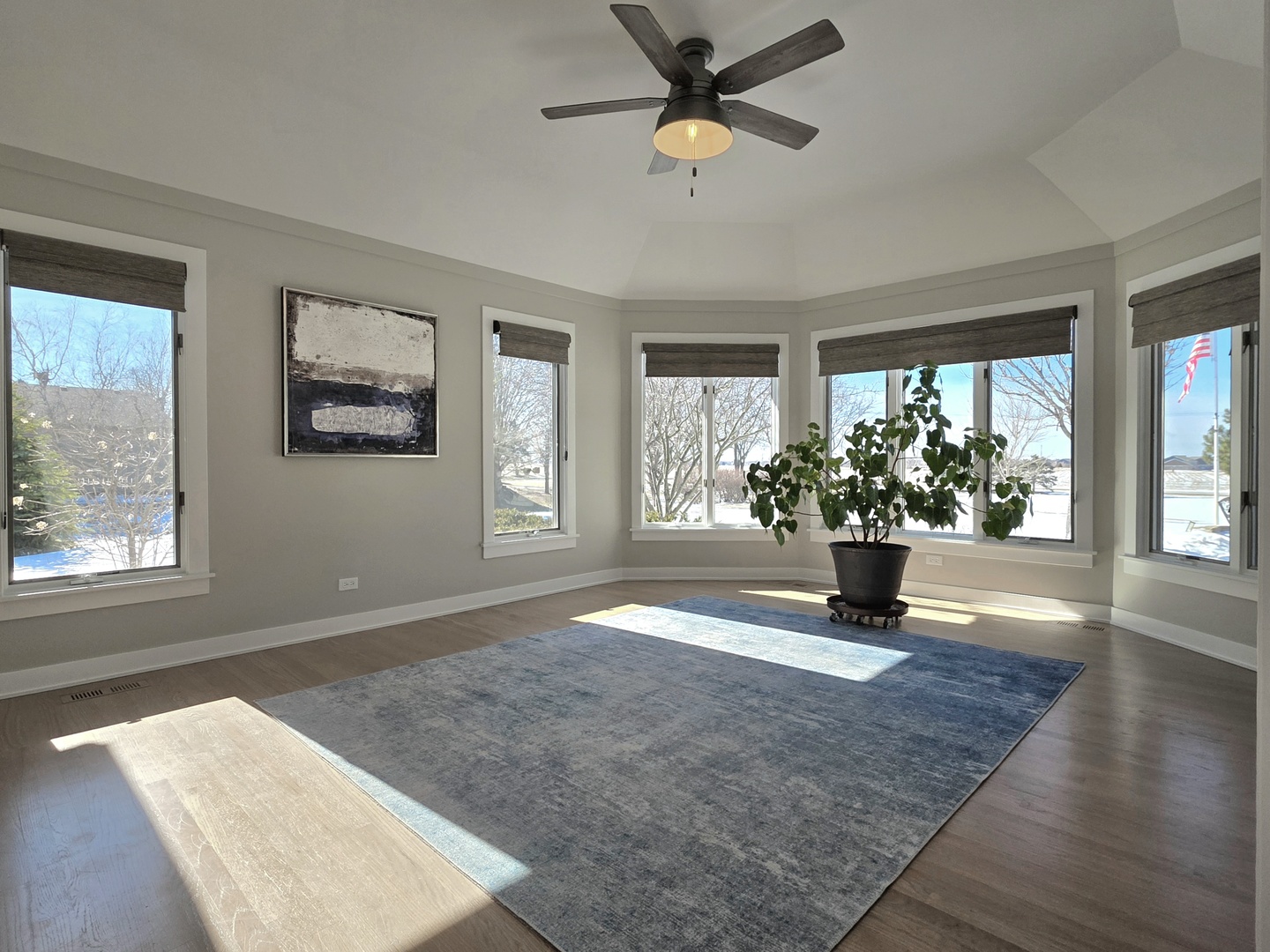 22545 South Spencer Road New Lenox, IL 60451 - Photo 12 of 47 a view of an empty room with a window and wooden floor