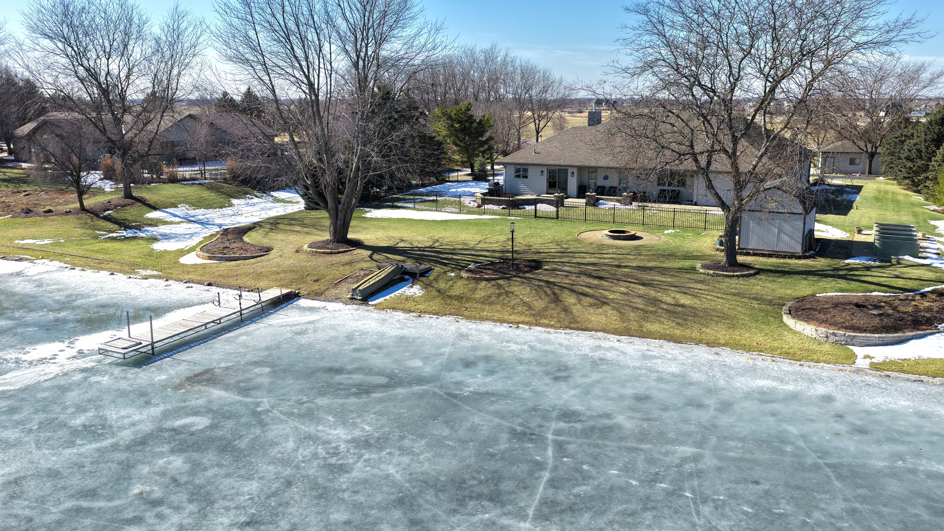 22545 South Spencer Road New Lenox, IL 60451 - Photo 29 of 47 a view of swimming pool with outdoor seating and trees in the background