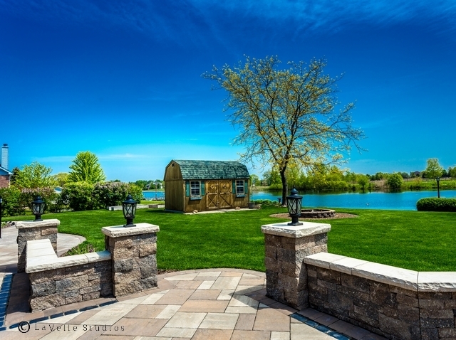22545 South Spencer Road New Lenox, IL 60451 - Photo 33 of 47 a view of a garden with plants and palm trees