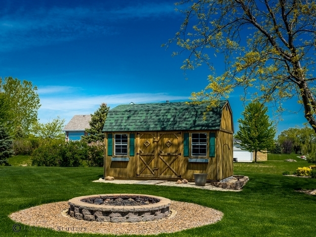 22545 South Spencer Road New Lenox, IL 60451 - Photo 34 of 47 a front view of a house with garden