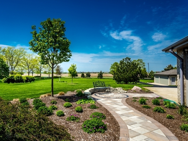 22545 South Spencer Road New Lenox, IL 60451 - Photo 44 of 47 a view of a park with plants and a bench
