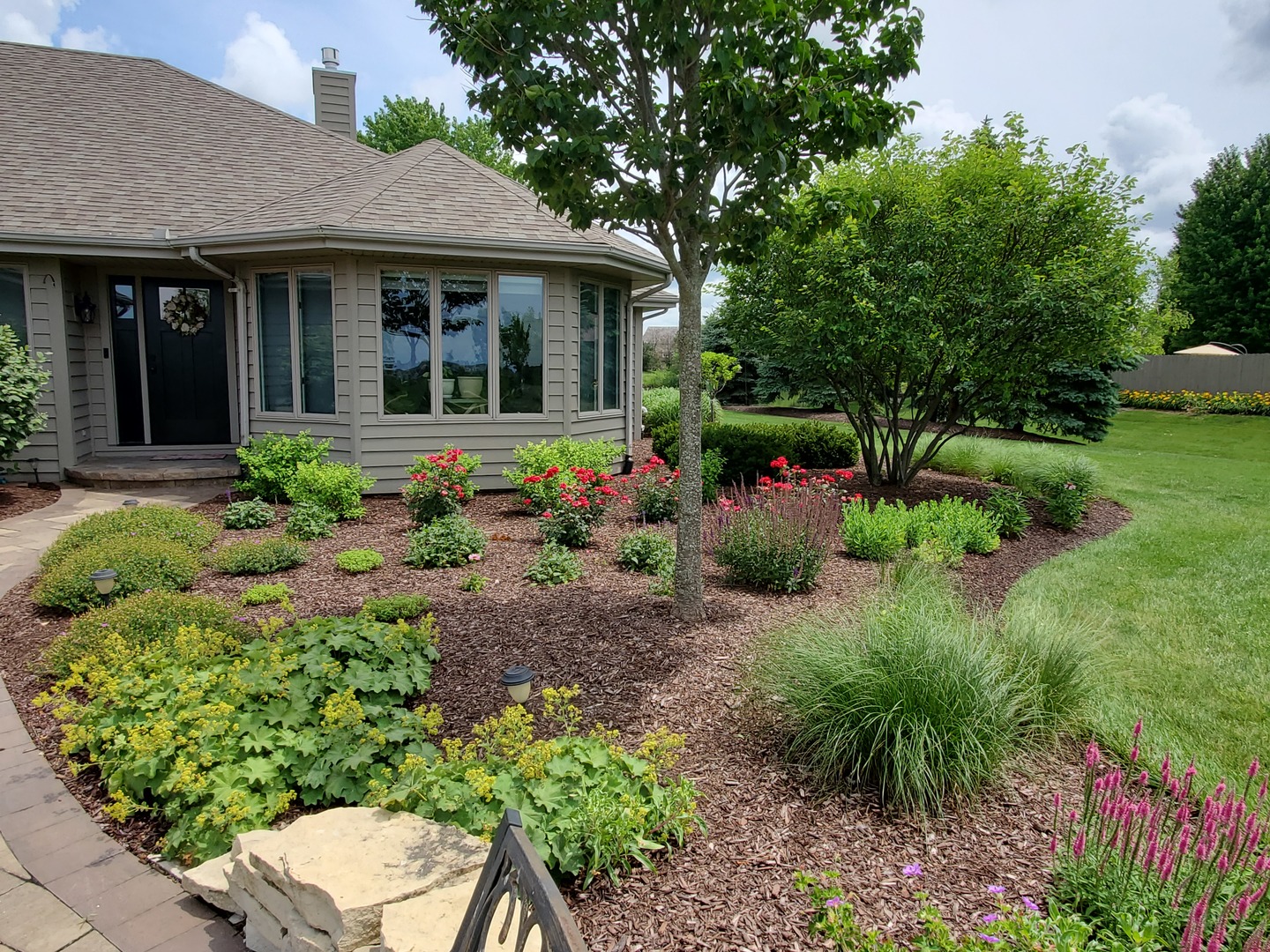 22545 South Spencer Road New Lenox, IL 60451 - Photo 45 of 47 a view of a house with potted plants