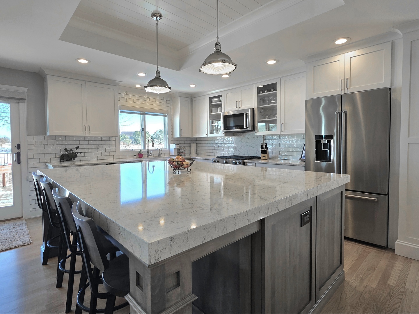 22545 South Spencer Road New Lenox, IL 60451 - Photo 5 of 47 a kitchen with stainless steel appliances granite countertop a kitchen island a stove a table and chairs