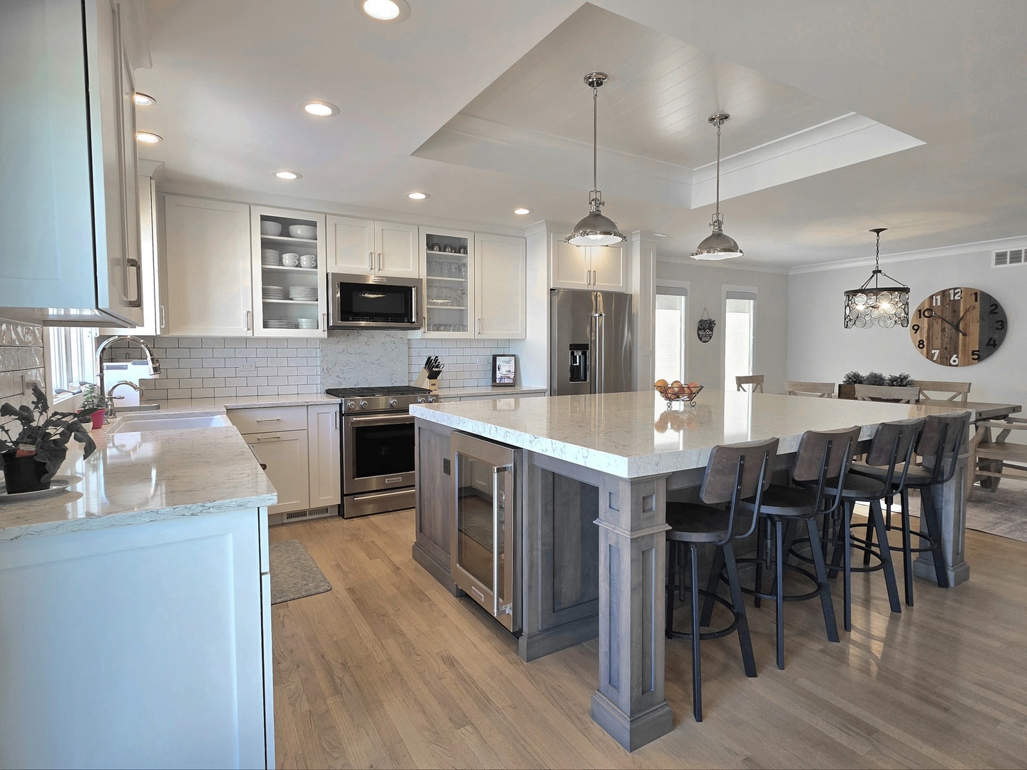 22545 South Spencer Road New Lenox, IL 60451 - Photo 6 of 47 a large kitchen with a table and chairs