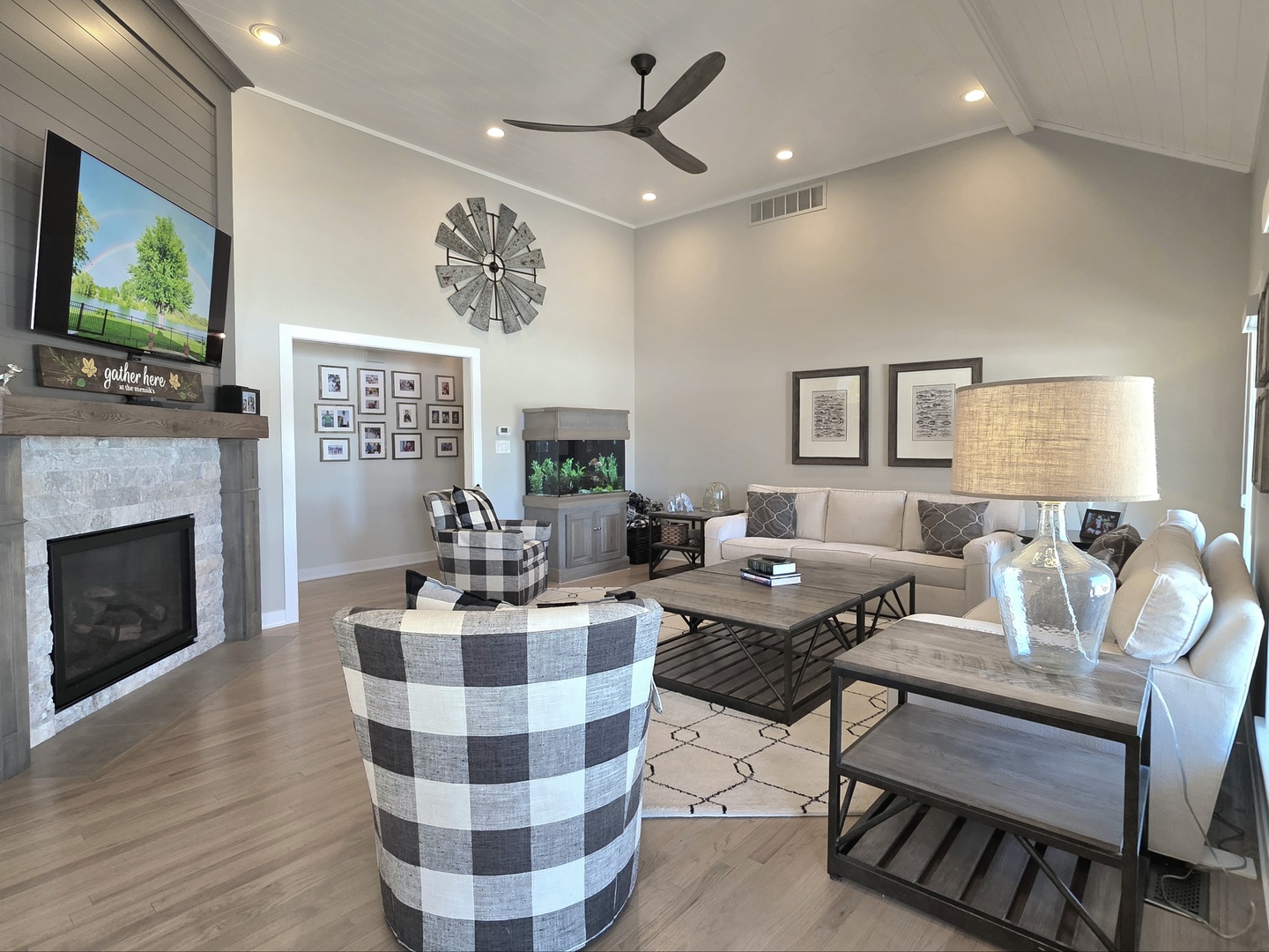 22545 South Spencer Road New Lenox, IL 60451 - Photo 10 of 47 a living room with furniture a fireplace and a flat screen tv