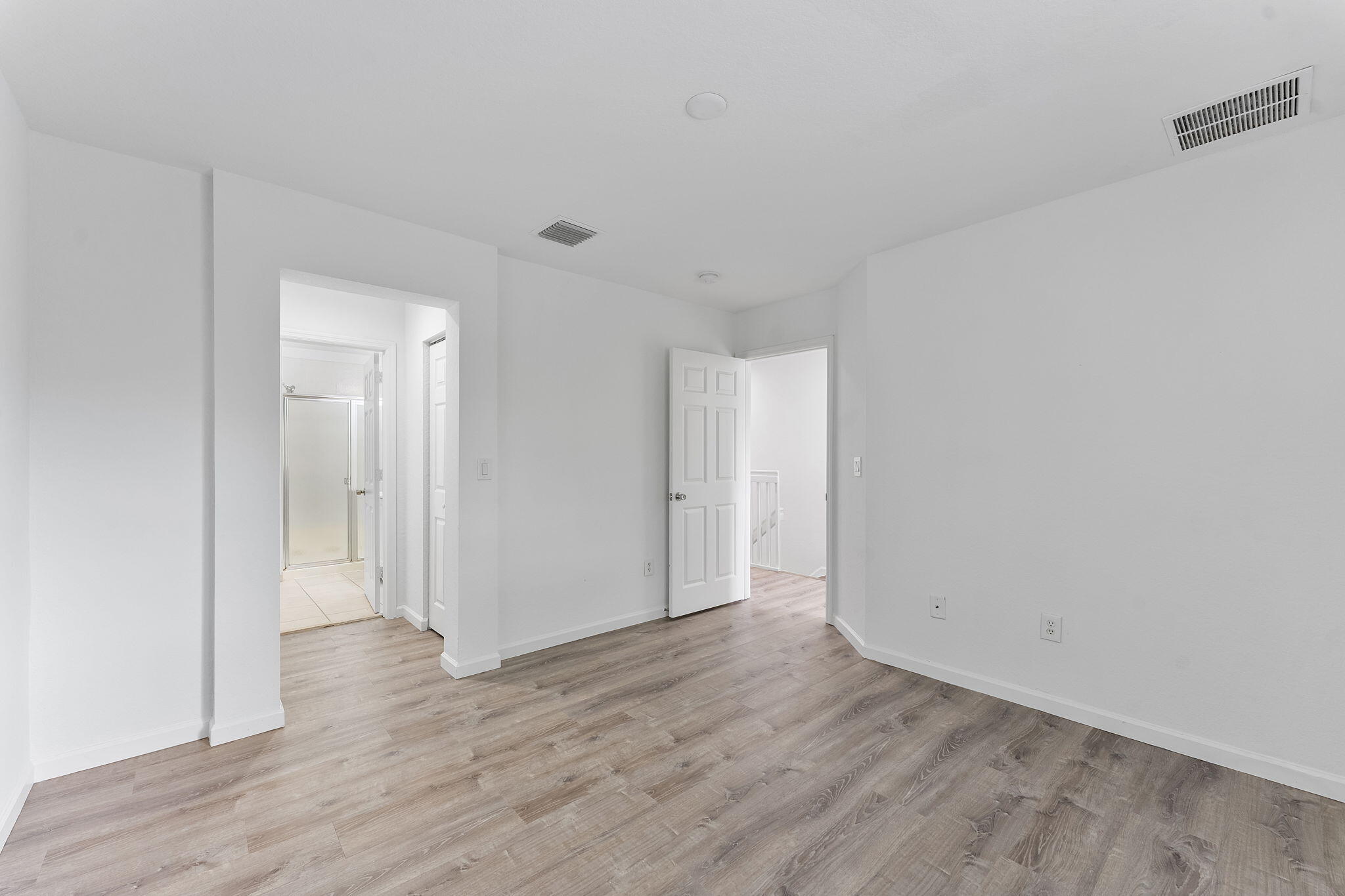 995 Abaco Lane Riviera Beach, FL 33404 - Photo 19 of 34 a view of an empty room and wooden floor