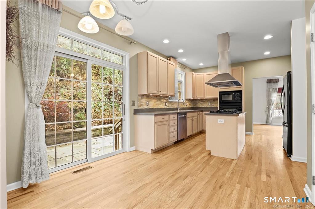 22 Apollo Road Bethel, CT 06801 - Photo 11 of 25 View to patio & kitchen