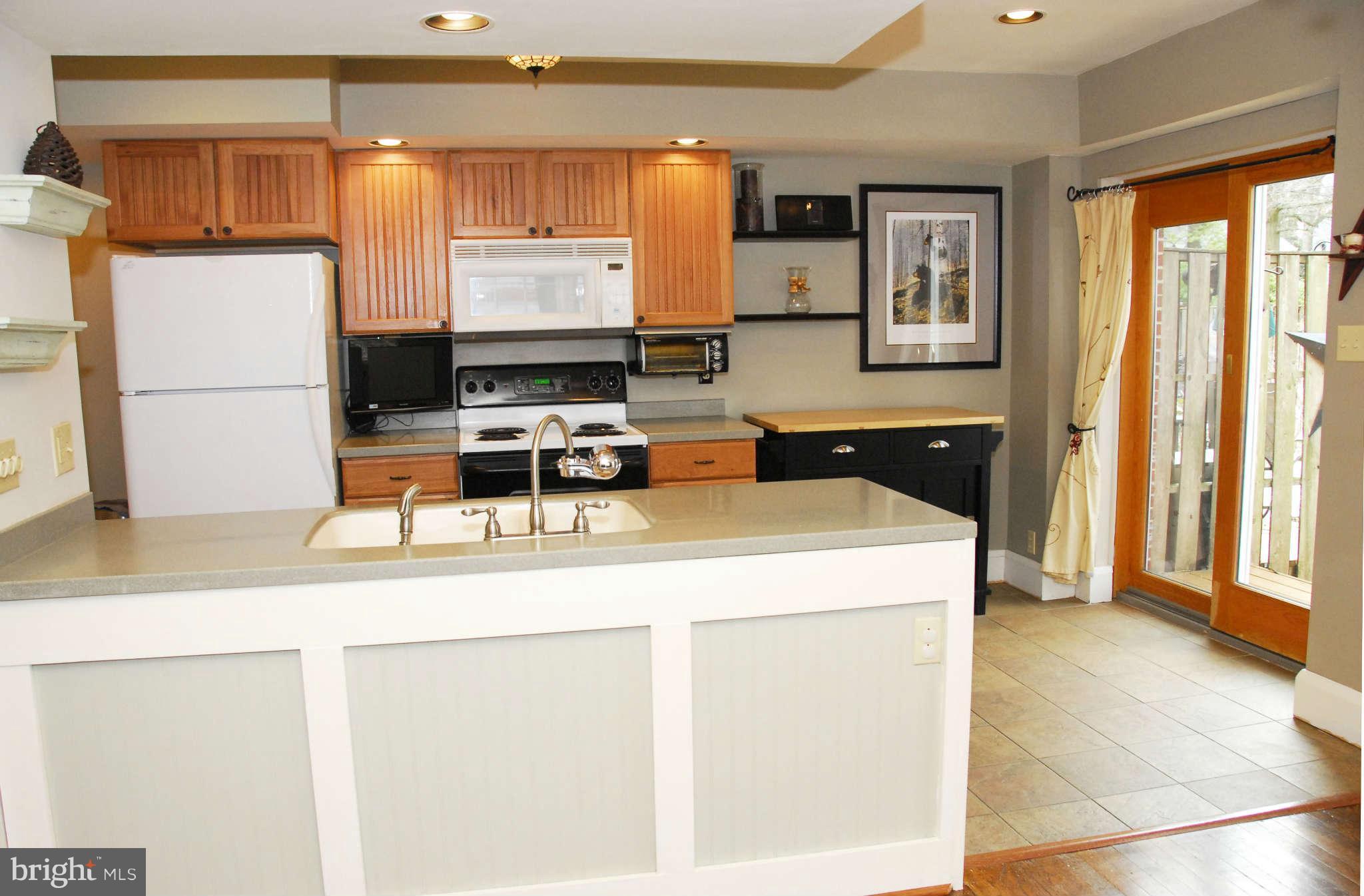 5702 Ranny Road Baltimore, MD 21209 - Photo 10 of 28 Kitchen with access to the Deck & Backyard