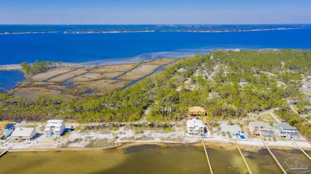 a view of an ocean with beach