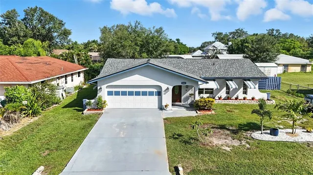 $284,900 | 1042 Malay Terrace Northwest, Port Charlotte, FL 33948